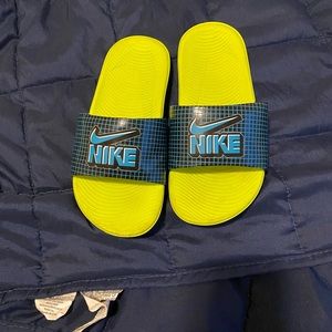 Kids Nike slides.